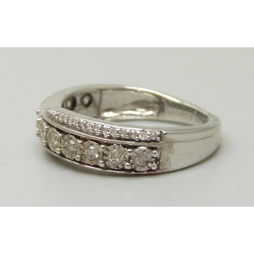 1058 - A 9ct white gold and 37 diamond half eternity ring, 2.6g, K