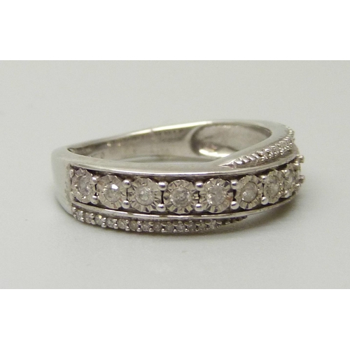 1058 - A 9ct white gold and 37 diamond half eternity ring, 2.6g, K