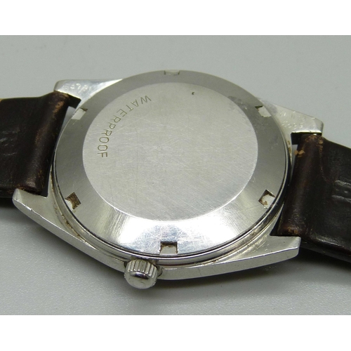 1062 - An Omega Geneve automatic date display wristwatch, with original buckle and an Omega carrier box