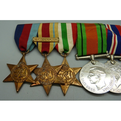 1063 - A set of six WWII medals, all named to 88918 J.D. Pournara