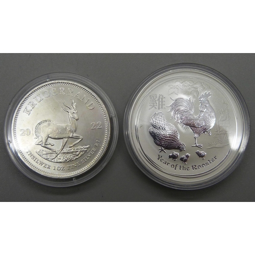 1069 - A 2017 silver Rooster 1oz coin and a silver Crocodile 1oz coin