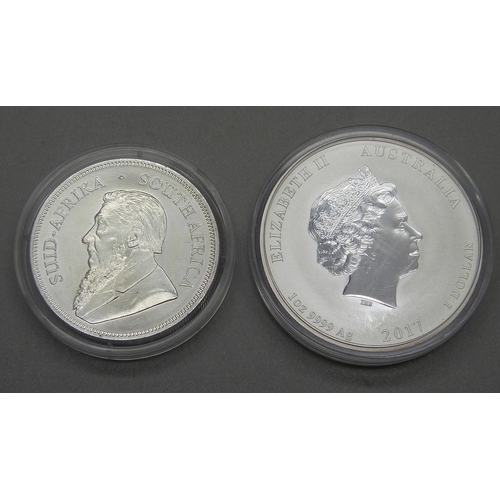 1069 - A 2017 silver Rooster 1oz coin and a silver Crocodile 1oz coin