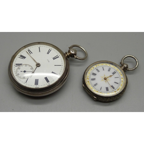 1071 - A lady's silver pocket watch, .935 silver and a silver pocket watch