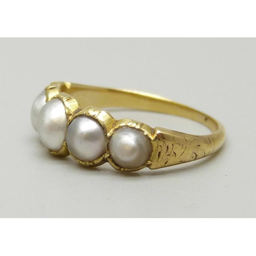 1072 - A yellow metal ring set with five half seed pearls, sizes approximately from 3.6mm to 5.4mm, 2.1g, J