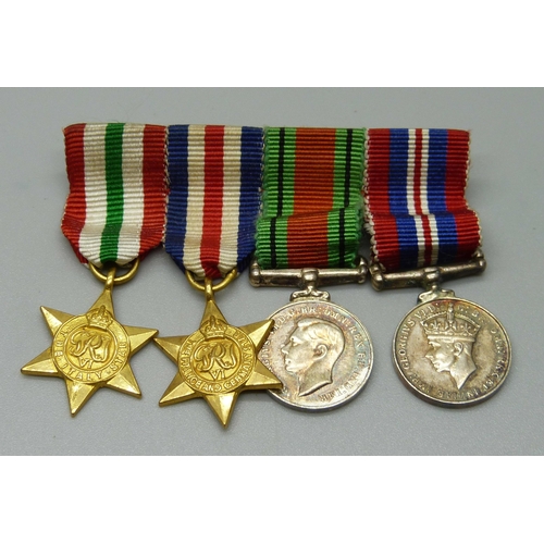 1076 - A set of WWII miniature medals including a Defence medal