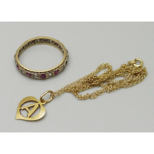 1079 - A yellow metal pendant on chain, and a yellow and white metal eternity ring, a/f, 3.1g