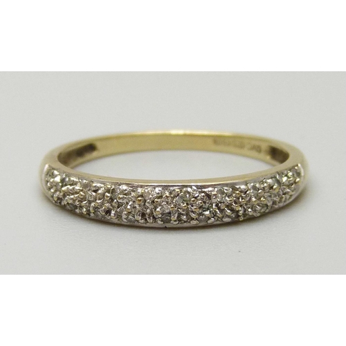 1081 - A 9ct gold ring set with small diamonds, 1.4g, O