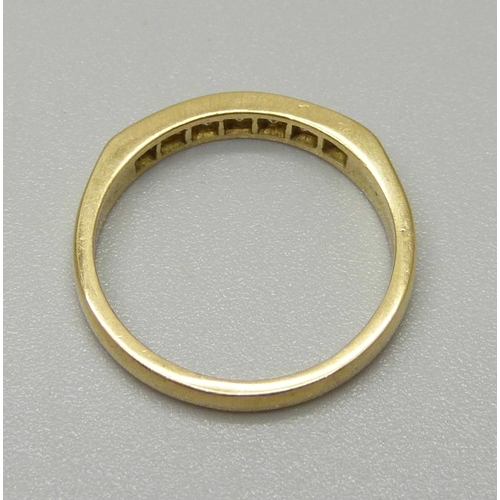 1082 - A yellow metal ring set with seven diamonds, approx 1.9mm, weighing approximately 0.21ct, 3.1g, N/O