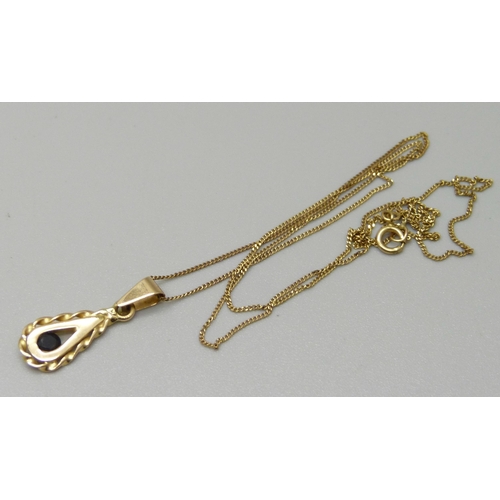 1106 - An 18ct gold pendant on a 9ct gold chain, 2.0g