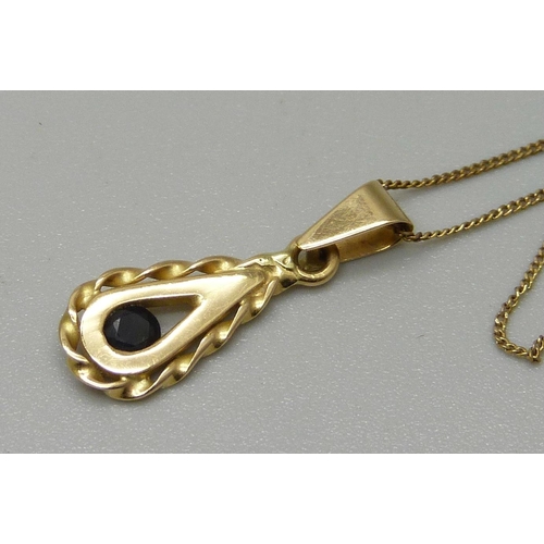 1106 - An 18ct gold pendant on a 9ct gold chain, 2.0g