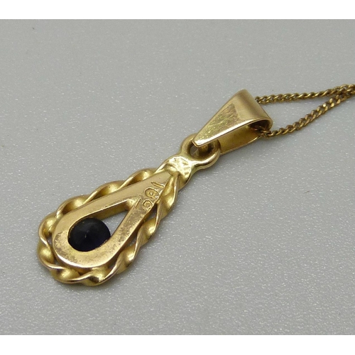 1106 - An 18ct gold pendant on a 9ct gold chain, 2.0g