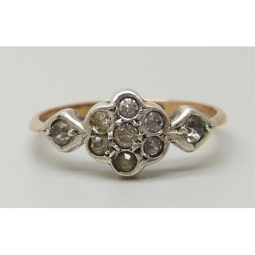 1107 - A 9ct gold and silver paste cluster ring, K/L