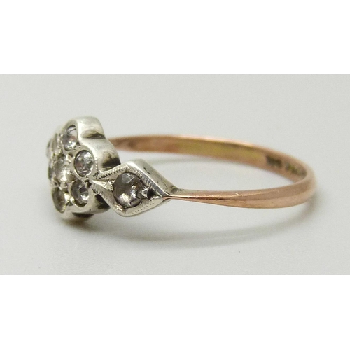 1107 - A 9ct gold and silver paste cluster ring, K/L