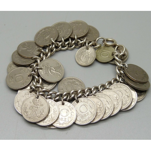 1108 - A silver bracelet with Denmark 10 Ore coin charms