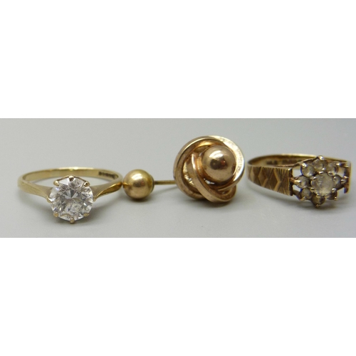 1118 - Two 9ct gold rings and two single earrings, 4.2g