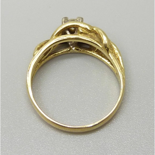 1119 - A yellow metal and diamond ring, hallmark worn, 4.6g, P