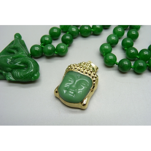 1125 - A jade style bead necklace with dragon pendant and a Buddha pendant