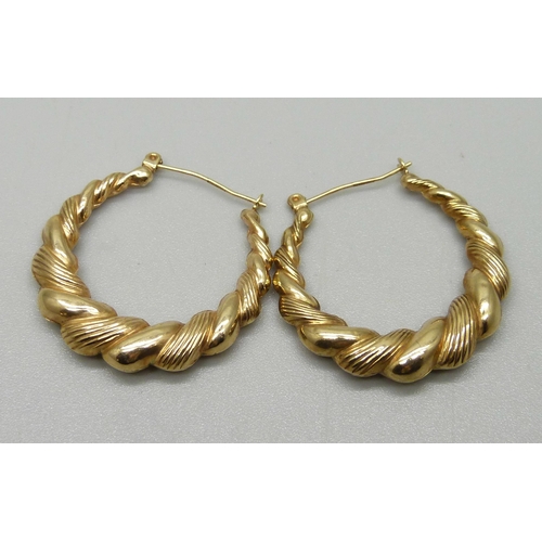 1126 - A pair of 9ct gold hoop earrings, 2.1g