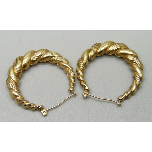 1126 - A pair of 9ct gold hoop earrings, 2.1g