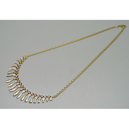 1128 - A 9ct gold necklet, 7.3g