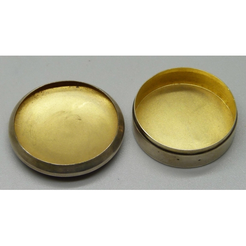 1137 - A silver and enamel pill box, 35mm diameter