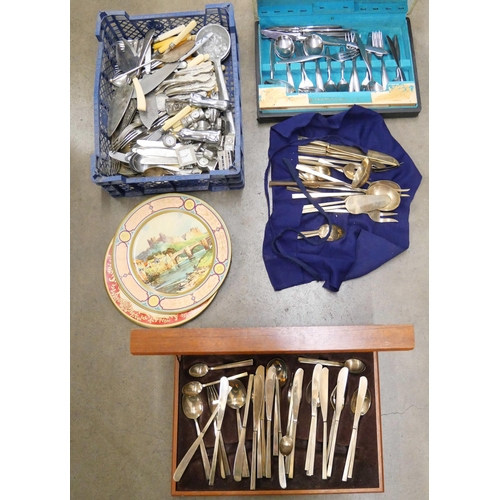 1153 - A collection of flatware, miniature clocks, tin plates and a canteen of cutlery **PLEASE NOTE THIS L... 