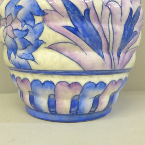 603 - A Crown Ducal Charlotte Rhead pitcher/vase blue peony pattern, base with star crack, 20cm