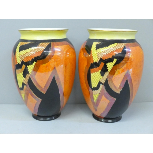 604 - A pair of 1920s Carlton Ware Art Deco Jazz Stitch vases, 17cm