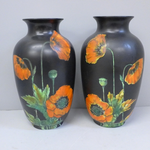 608 - A pair of Crown Ducal vases decorated with poppies, 17.5cm