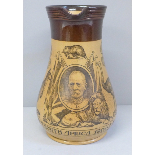 610 - A Doulton Lambeth stoneware Boer War jug decorated with portraits of Lord Roberts, Baden-Powell and ... 