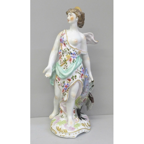 612 - A 19th Century porcelain figure of Juno and the Peacock, 26.5cm