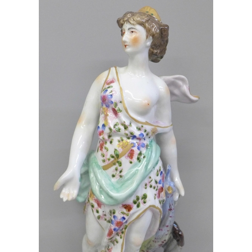 612 - A 19th Century porcelain figure of Juno and the Peacock, 26.5cm