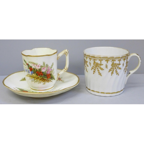 629 - A 19th Century Royal Worcester cup and saucer decorated with sprays of flowers, cup a/f, hairline, a... 