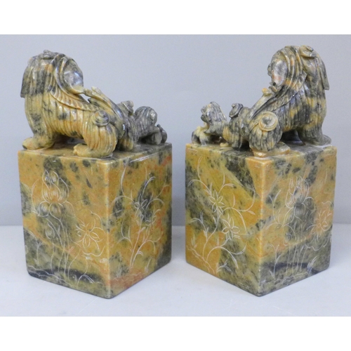 637 - A pair of Chinese carved soapstone bookends, 16cm