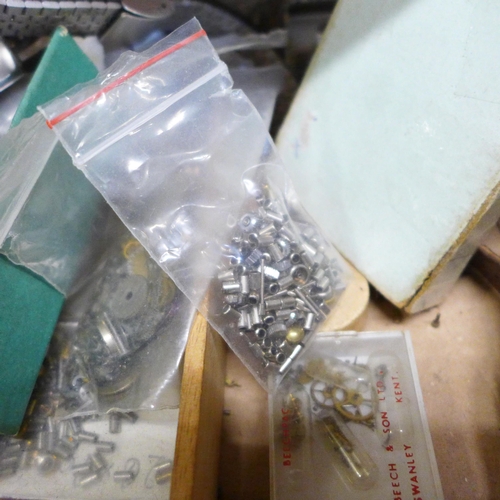 673 - A collection of watch repair materials including straps