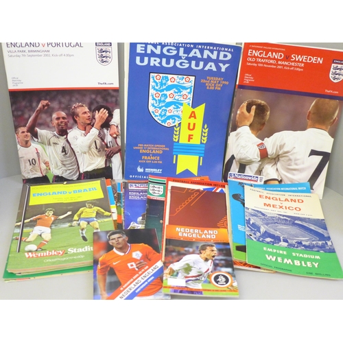 693 - Football memorabilia; England home and away football programmes, school to full international, 1961 ... 