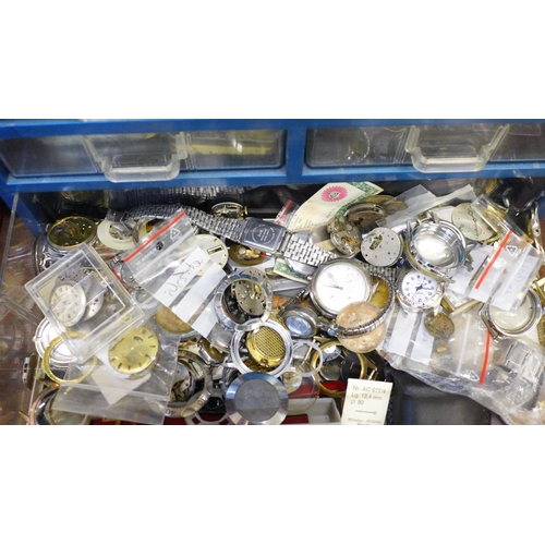 694 - Two plastic cabinets containing watch parts