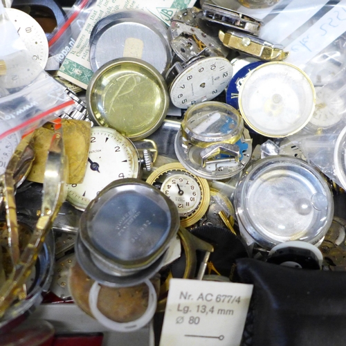 694 - Two plastic cabinets containing watch parts