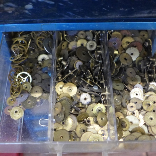 694 - Two plastic cabinets containing watch parts