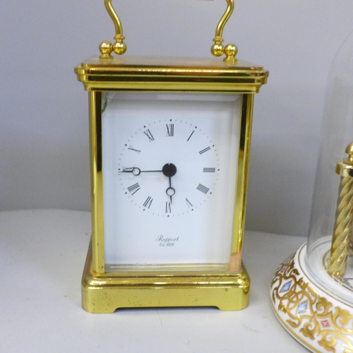 701 - Three Franklin Mint The Carousel mantel clocks and a Rapport carriage clock