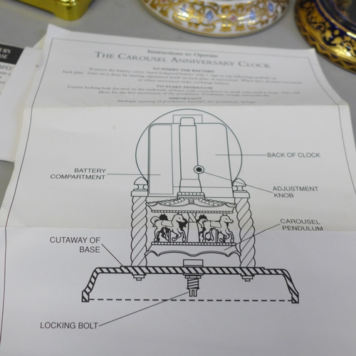 701 - Three Franklin Mint The Carousel mantel clocks and a Rapport carriage clock