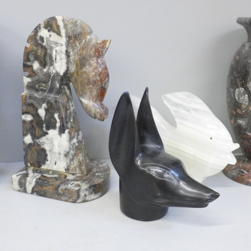 708 - A pair of hardstone vases, one other carved stone figure and two others