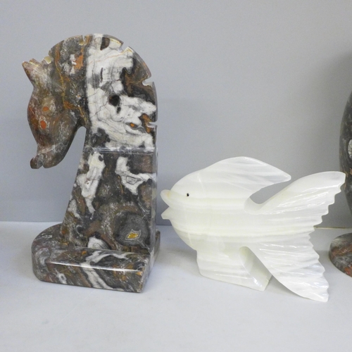 708 - A pair of hardstone vases, one other carved stone figure and two others