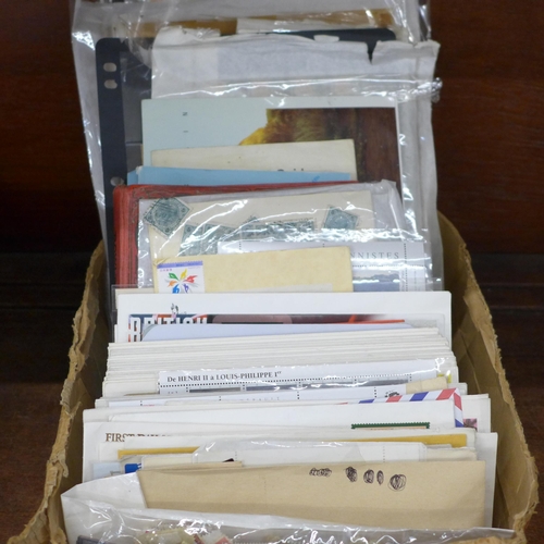 711 - Stamps; a box of stamps, covers, etc.