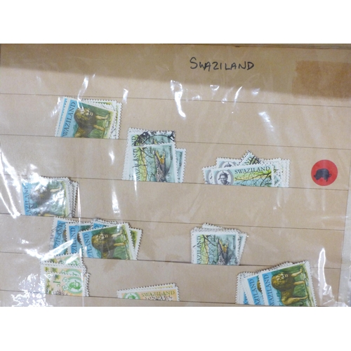 711 - Stamps; a box of stamps, covers, etc.