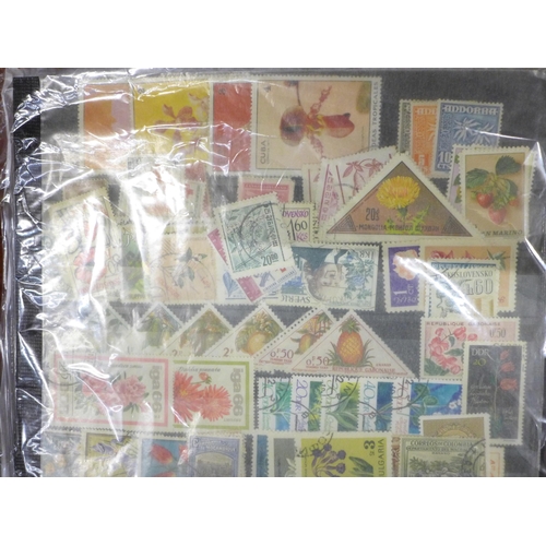 711 - Stamps; a box of stamps, covers, etc.