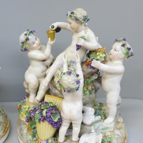 712 - A pair of 18th Century Meissen cherub figure groups, a/f, one arm restored