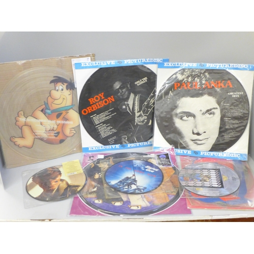 713 - Picture disc singles and LP records, including Status Quo, David Bowie, Rogue, Phil Collins, TLC, Th... 