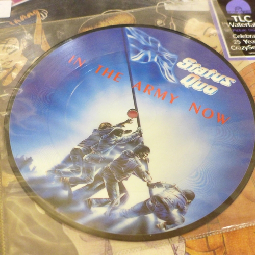 713 - Picture disc singles and LP records, including Status Quo, David Bowie, Rogue, Phil Collins, TLC, Th... 