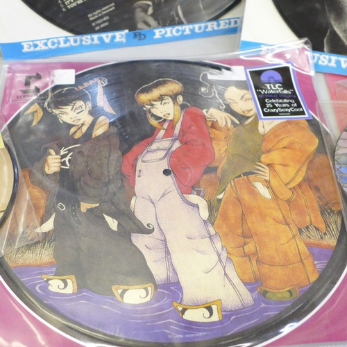 713 - Picture disc singles and LP records, including Status Quo, David Bowie, Rogue, Phil Collins, TLC, Th... 